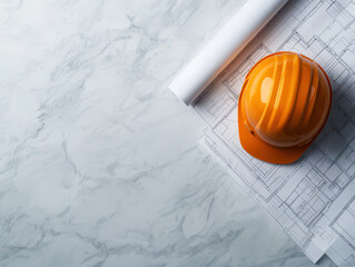 Housing property demand concept. macro view of architectural blueprints with orange hard hat