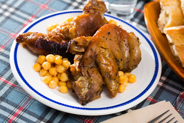 Spanish dish Pies de cerdo con garbanzos