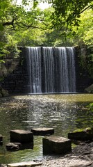 Waterfall cascading over stone dam in a lush forest. Possible use Nature background