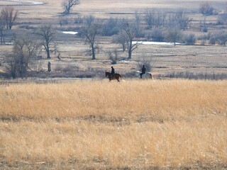 Horseback riding on the winter prairie, Boulder, Colorado
