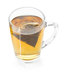 Tea bag in glass cup with hot drink isolated on white