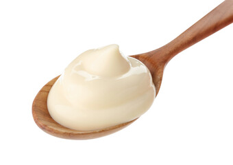 Tasty mayonnaise sauce in wooden spoon isolated on white