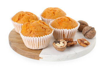 Tasty carrot muffins and walnuts isolated on white