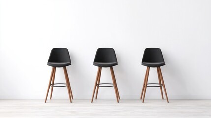Three Modern Black Barstools In A White Room