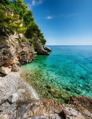 Scenic Rocky Coastline with a Vibrant Mix of Blue and Green Waters