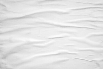 white crumpled and creased glued wrinkled paper poster texture background