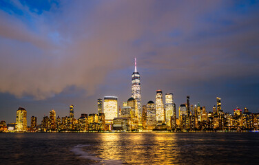 New York City skyline. NYC skyscrapers. Manhattan skyscrapers at dusk. NY cityscape with lights....