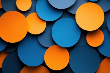 Overlapping orange and blue circles create an abstract design. Ideal for backgrounds, presentations, and modern designs.