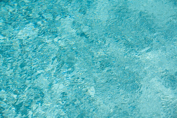 Background of water, surface blue swimming pool.
