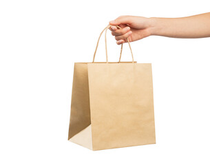 Woman hand holding shopping bag on isolated background.