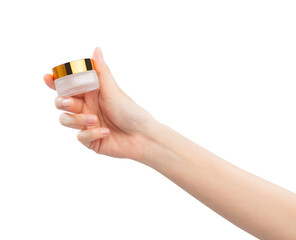 Hands holding cream product, blank white plastic cosmetic tube on background. Mockup of packaging.