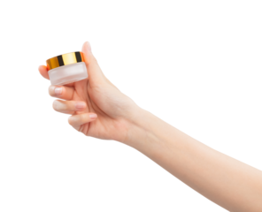 Hands holding cream product, blank white plastic cosmetic tube on background. Mockup of packaging.