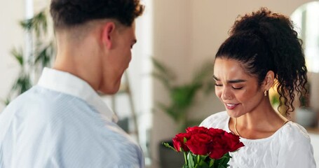 Flowers, romance or surprise with couple in home together for anniversary or valentines day. Hug, smile and thank you with man giving bouquet to woman in apartment for celebration, gift or love