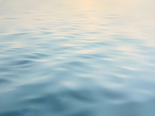 Serene Water Surface: A calming abstract image of rippling water, capturing the gentle motion and ethereal beauty of nature.  The soft, muted tones evoke a sense of tranquility and serenity.