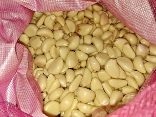 Healthy and Fresh Whole Peeled Garlic Cloves.