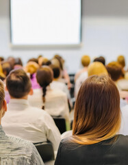 Obraz premium attentive audience watching a presentation in a meeting room