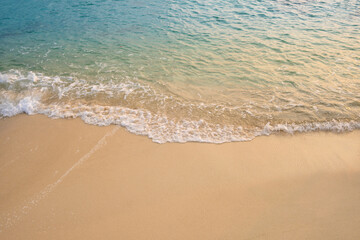 nature of the beach and sea Summer with sunshine, sandy beaches, clear blue waters sparkling against the blue sky. On an island with good ecology and environment Background for summer vacation