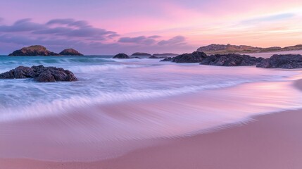 Obraz premium Pastel Sunrise on a Coastal Beach