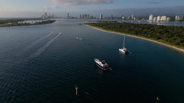 Aerial views of luxury yachts near Wavebreak Island and the Broadwater on the Northern end of the Gold Coast, Australia