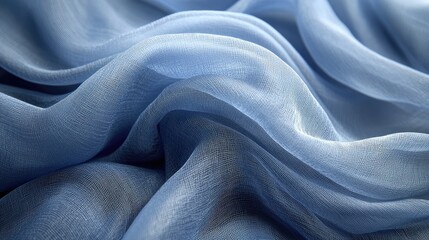 Soft, flowing blue fabric draping elegantly, creating a serene and calming atmosphere