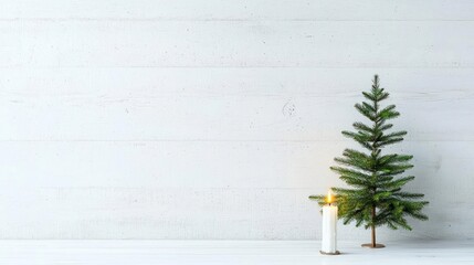 Small Christmas Tree With White Candle On White Wall