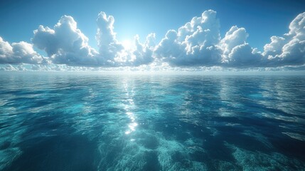 Serene ocean view with vibrant blue waters and fluffy clouds reflecting sunlight