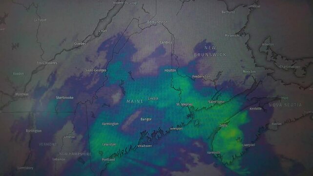 Animated weather map showing precipitation over Maine and New Brunswick. Static camera, map view.