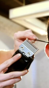 Man getting his hair trimmed with trimmer