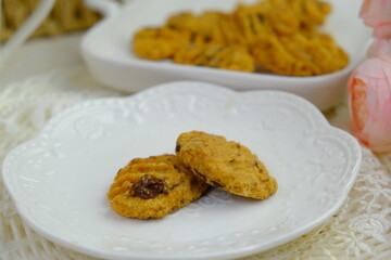 Popular cookies in Malaysia during celebration of Eid Mubarak (Hari Raya) on white isolated background called coffee and chips