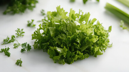 Fototapeta premium Fresh green lettuce and herbs on marble surface, showcasing vibrant colors and textures. Perfect for salads and healthy dishes