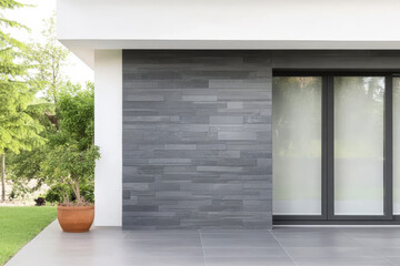 Modern exterior design featuring stone and minimalist architecture in a serene garden setting