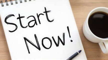 A motivational note saying "Start Now!" is written on a notepad beside a cup of coffee and a pen, suggesting a call to action and productivity.