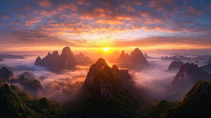 Majestic Sunrise Over Misty Mountain Peaks
