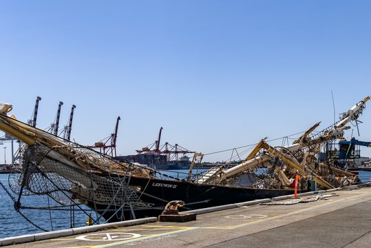 Fremantle Western Australia - 09 17 2024: The cleanup and salvage operation begins on the damaged training ship Leeuwin after being hit by the container ship Maersk Shekou.