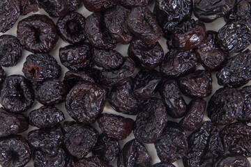 Prunes as a background, top view, close-up