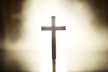 Silhouetted Cross with Radiant Light Background - Spiritual Symbolism and Hope