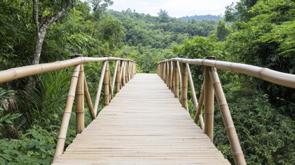 Fototapeta premium serene bamboo bridge stretches over lush greenery, inviting exploration