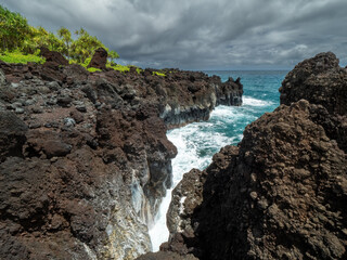 Get with me to the Waianapanapa Park and the rough lava cliffs which make the water splash up