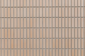 Vertical tiles wall beige ceramic clay with copy space