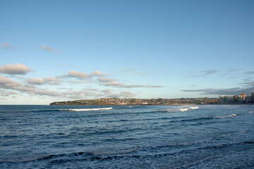 Panoramic Scene of Gijón Coastline Featuring the City Skyline and Ocean
