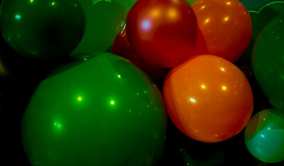 colorful balloons on a green background