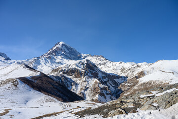 Nature of snow-capped mountains in the Caucasus Mountains in winter