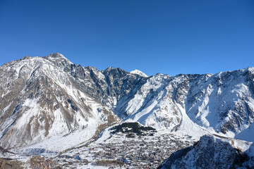 Fototapeta premium Nature of snow-capped mountains in the Caucasus Mountains in winter