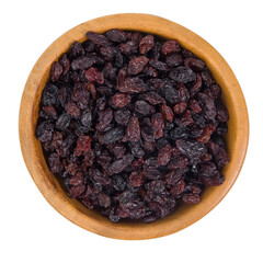 Black raisins in a wooden bowl isolated on white background cutout