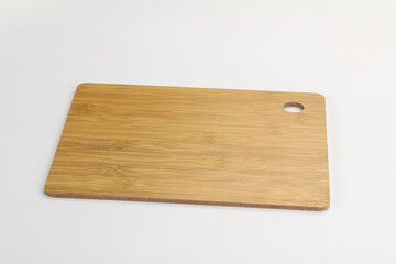 Wooden cutting board isolated on white background