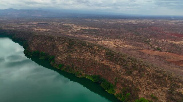 Chala Crater Lake in Kenya, aerial drone view of volcanic caldera lake
