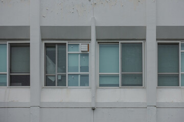 Fototapeta premium A collection of various exterior windows on buildings, showcasing diverse architectural styles and materials.