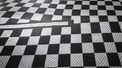 Obraz premium Smooth black and white mosaic background featuring classic checkerboard pattern with bold design