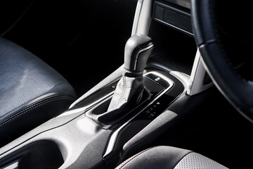 automatic transmission shift selector in the car interior. Closeup a manual shift of modern car...