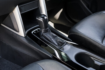 automatic transmission shift selector in the car interior. Closeup a manual shift of modern car...